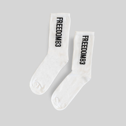 F83 Crew Socks White — Freedom 83 logo crew sock pair